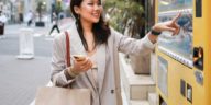 Woman using weird vending machine in Japan