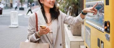 Woman using weird vending machine in Japan