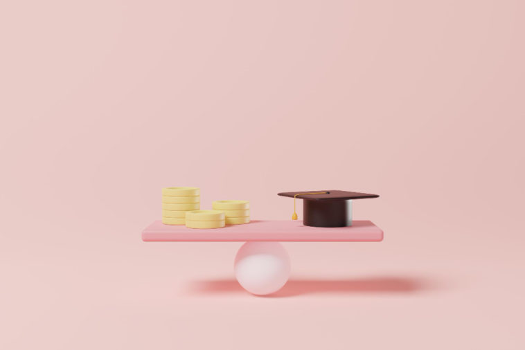 coins and a graduation cap on a balancing plank