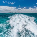 water trail left by boat