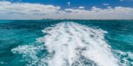 water trail left by boat