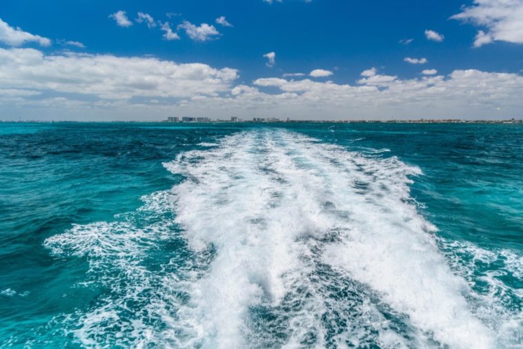 water trail left by boat