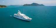 aerial view of a luxury yacht sailing the sea