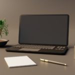 writing tools on a grey table