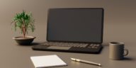 writing tools on a grey table