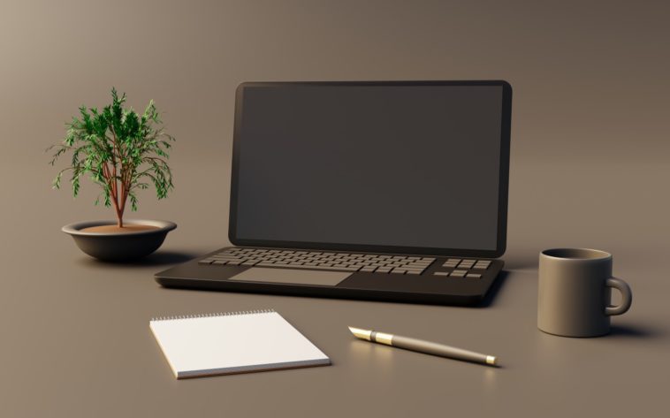 writing tools on a grey table