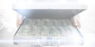 metal suitcase filled with american hundred dollar bills