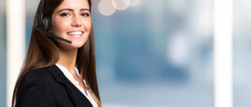smiling woman with a headset