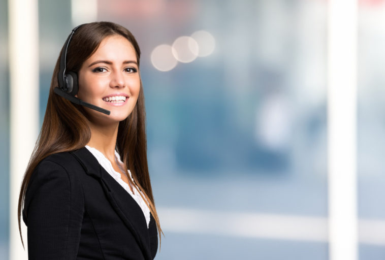 smiling woman with a headset