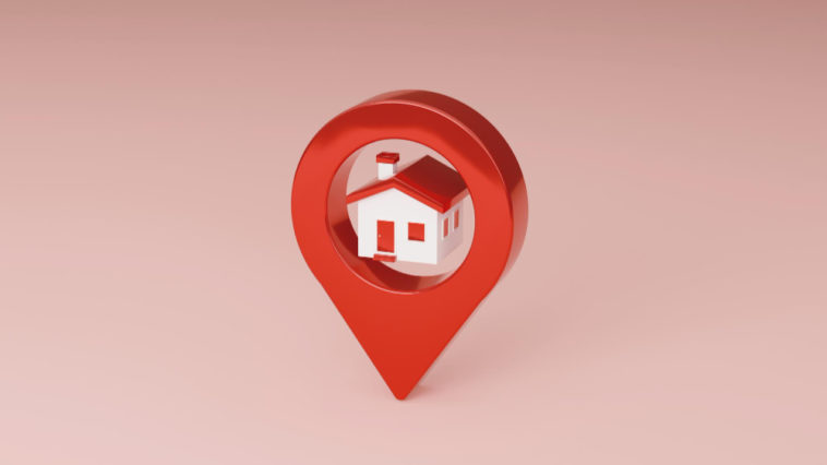 red location pin with a house icon