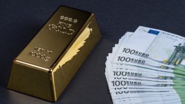 a gold bar and a stack of euros