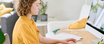 woman working on a computer at a desk