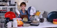 woman showing clay ceramic products