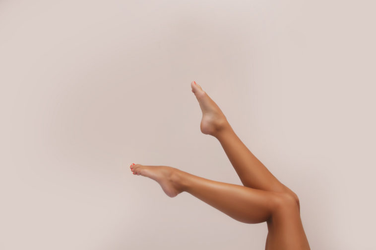 close-up of woman's tanned feet