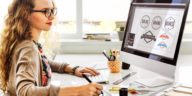 woman working on designing logos on a computer