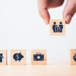 wooden blocks with insurance icons