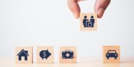 wooden blocks with insurance icons