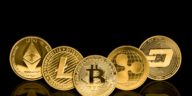 gold cryptocurrency coins with a black background