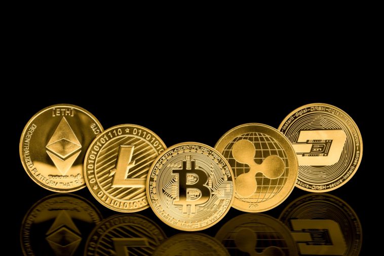 gold cryptocurrency coins with a black background