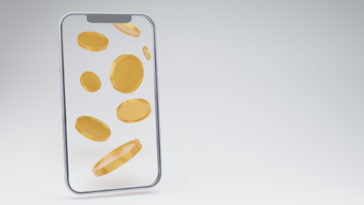 smartphone blank display with gold coins falling on a white background