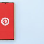 smartphone with pinterest logo on the screen