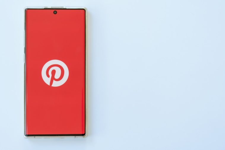 smartphone with pinterest logo on the screen