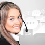 young woman with headphones with chat bubbles behind her