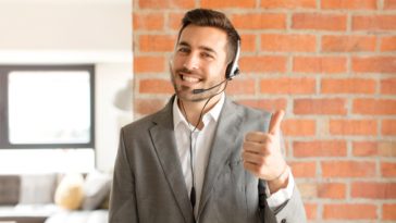 smiling man with a headset