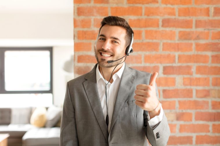 smiling man with a headset