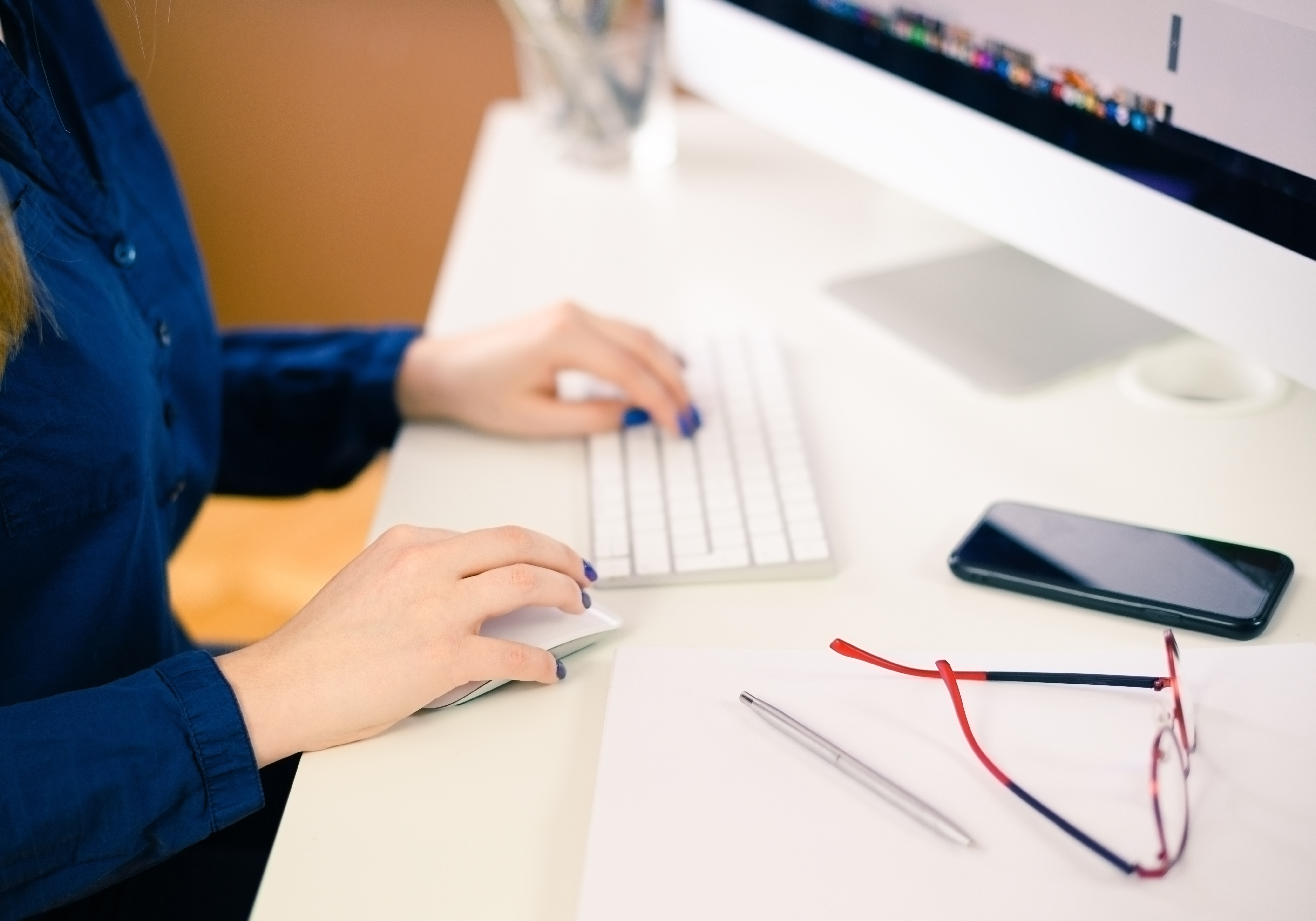 woman using computer in a home office