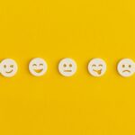 emoticon smiley faces on a yellow background