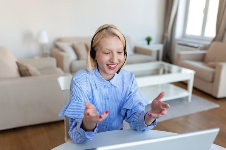 woman talking with headset at home