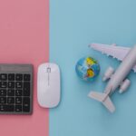 computer keyboard, computer mouse, globe, model airplane