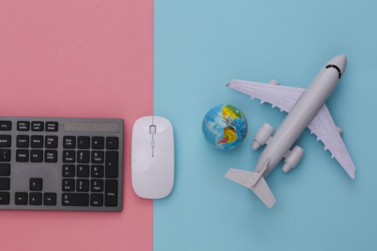 computer keyboard, computer mouse, globe, model airplane