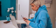 woman working on a laptop from home