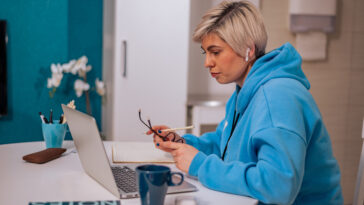 woman working on a laptop from home