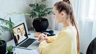 student on a video call with a tutor