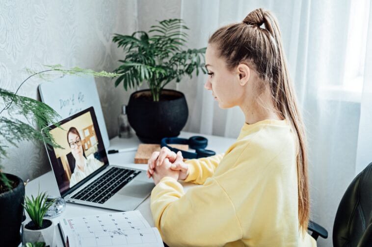 student on a video call with a tutor