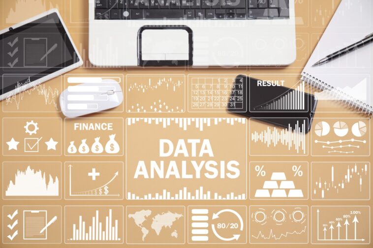 data analysis icons on a work desk