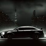 black Lexus with a dark city background